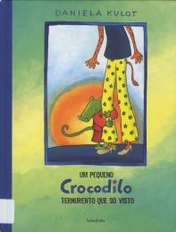 Um pequeno crocodilo ternurento que só visto Um pequeno crocodilo ternurento que só visto
